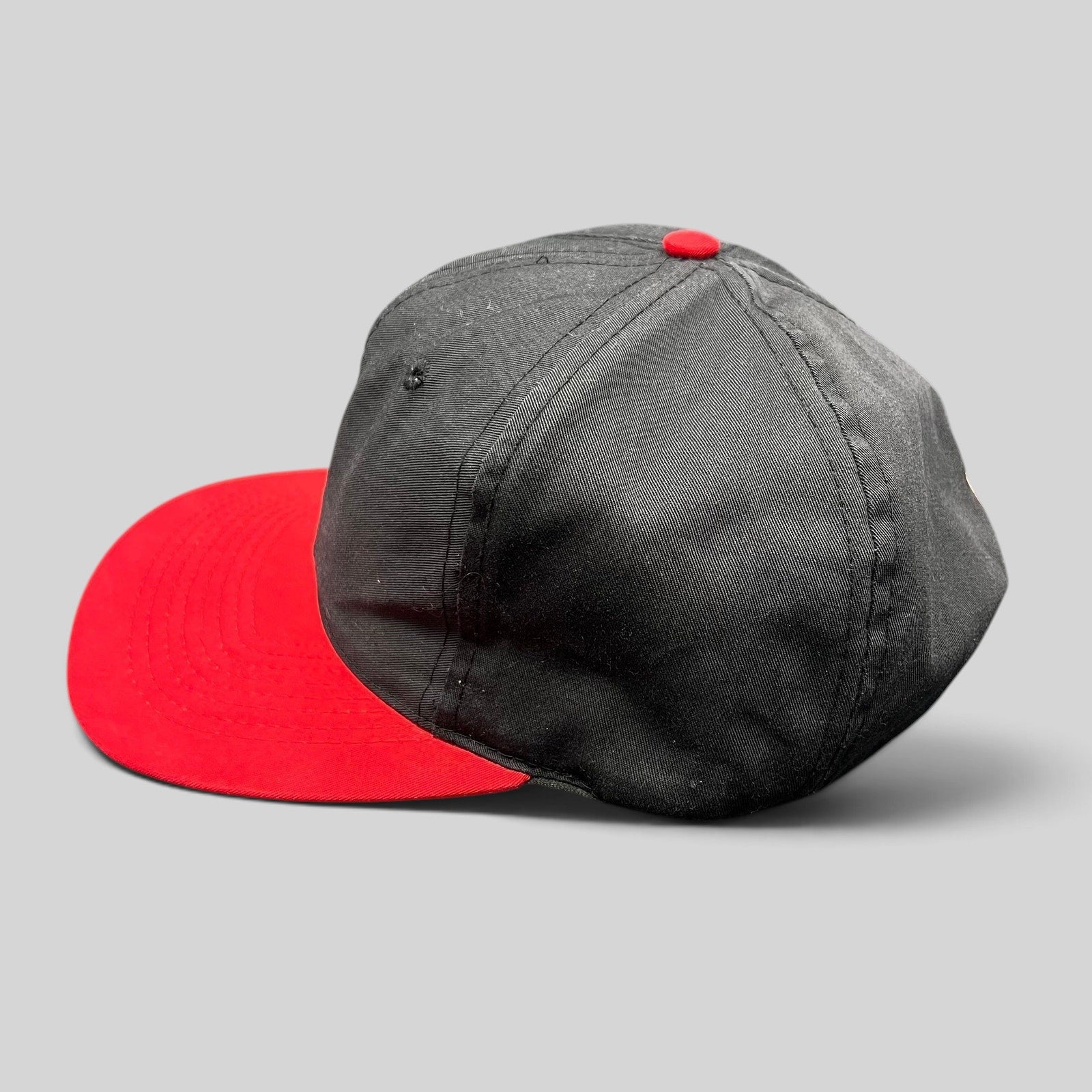 Raree Finds vintage 1992 Juice movie promo snapback hat featuring a black cotton crown and a red brim.