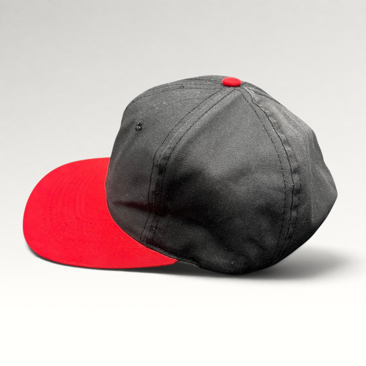 Raree Finds vintage 1992 Juice movie promo snapback hat featuring a black cotton crown and a red brim.
