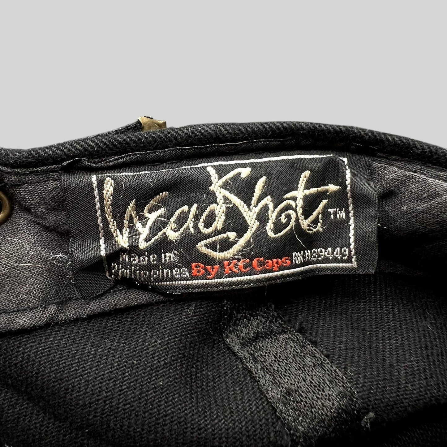 Raree Finds vintage 1990s KC Caps HeadShots label inside a black cotton hat