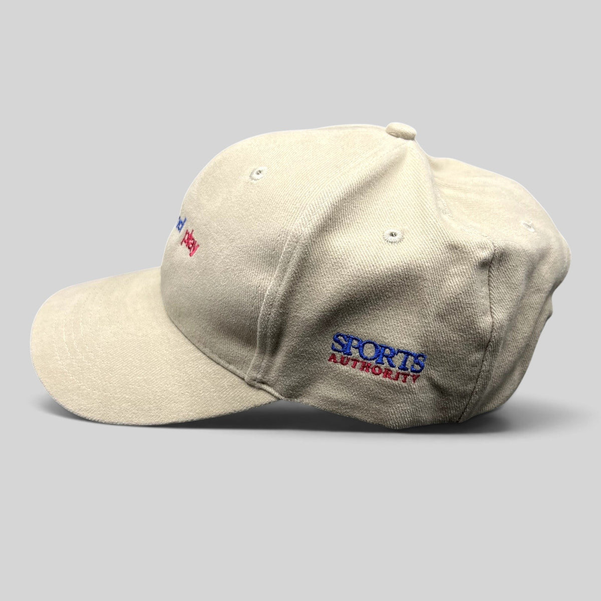 Raree Finds vintage khaki strapback dad hat with embroidered Sports Authority logo and Get Out And Play slogan