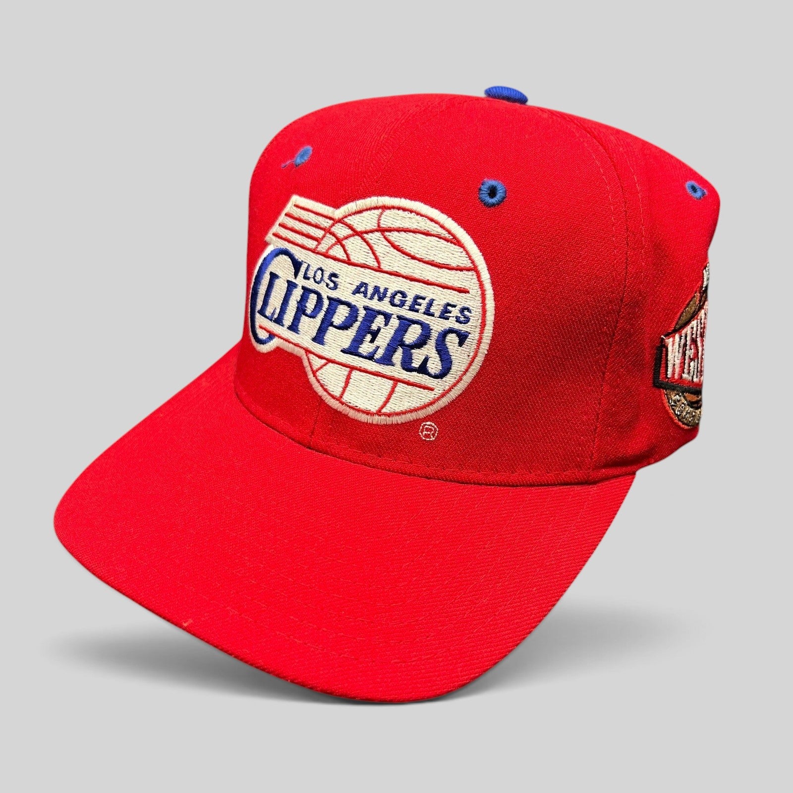Raree Finds vintage Starter LA Clippers red fitted hat with classic 90s script logo and blue embroidered details