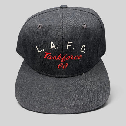 Raree Finds vintage New Era Pro Model LAFD Task Force 60 black snapback hat with red and white embroidered lettering.