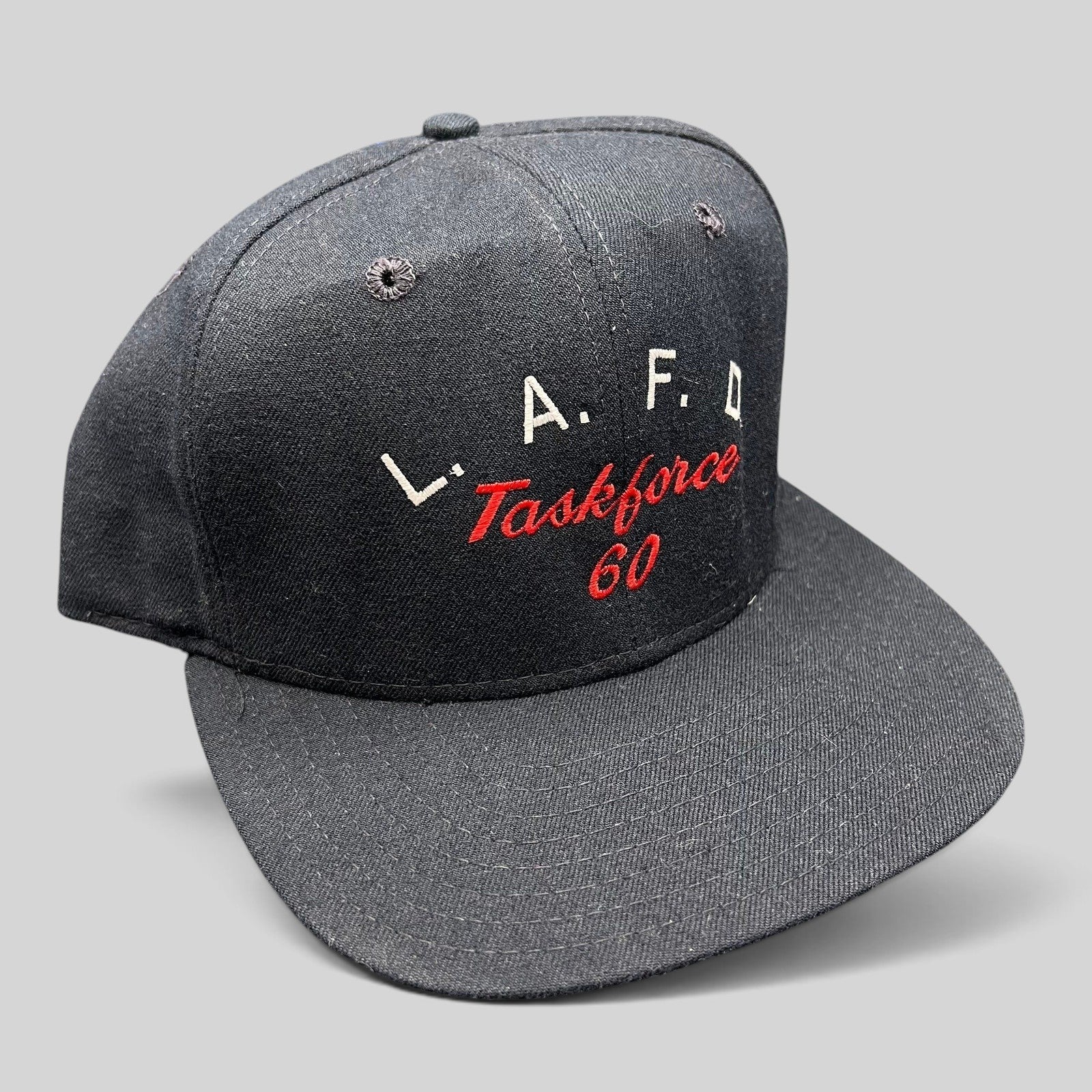 Raree Finds vintage New Era Pro Model black snapback hat with LAFD Task Force 60 red and white embroidery