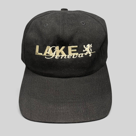 Raree Finds vintage black cotton strapback hat with embroidered Lake Geneva script logo and crest graphic