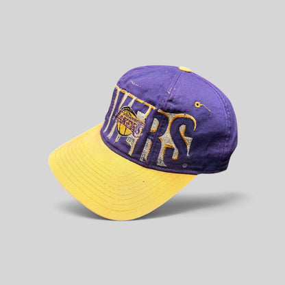 Raree Finds vintage 90s LA Lakers Starter snapback hat in purple and gold with raised embroidery and green underbrim.