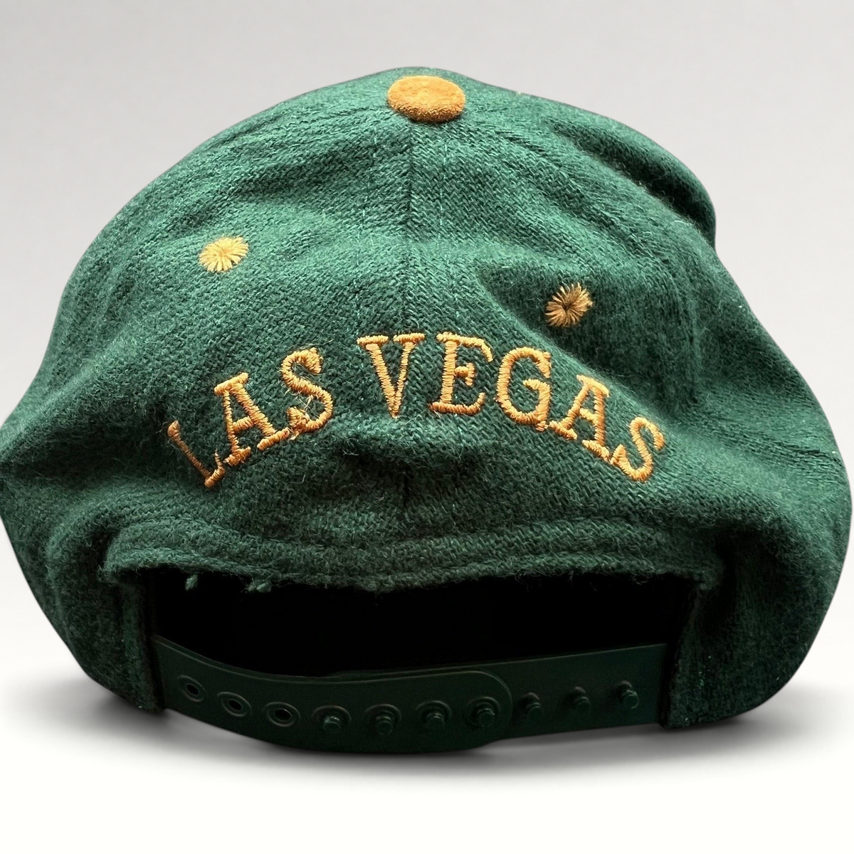 Raree Finds vintage green wool snapback hat with Las Vegas embroidered on the back and tan suede button detail