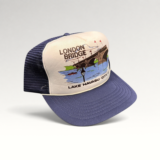 Raree Finds vintage 80s navy and white foam trucker hat featuring a London Bridge Lake Havasu City graphic print