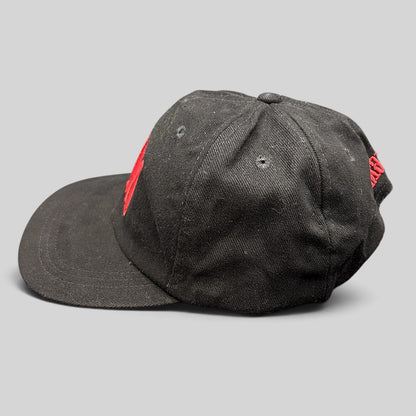 Raree Finds vintage black strapback hat with red embroidered Marlboro logo and leather strap adjustment