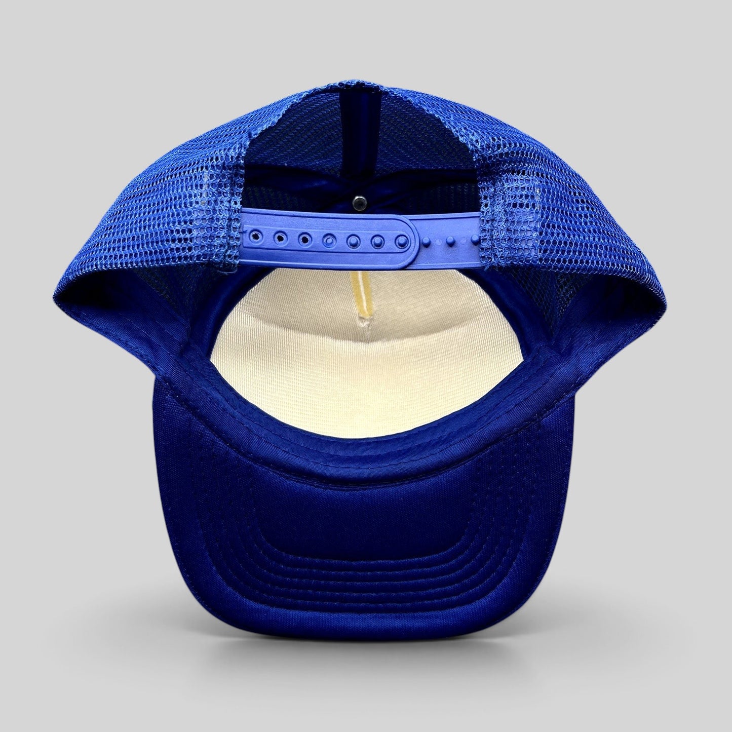 Raree Finds vintage Marlin Masters trucker hat showing the blue mesh back and adjustable snapback closure