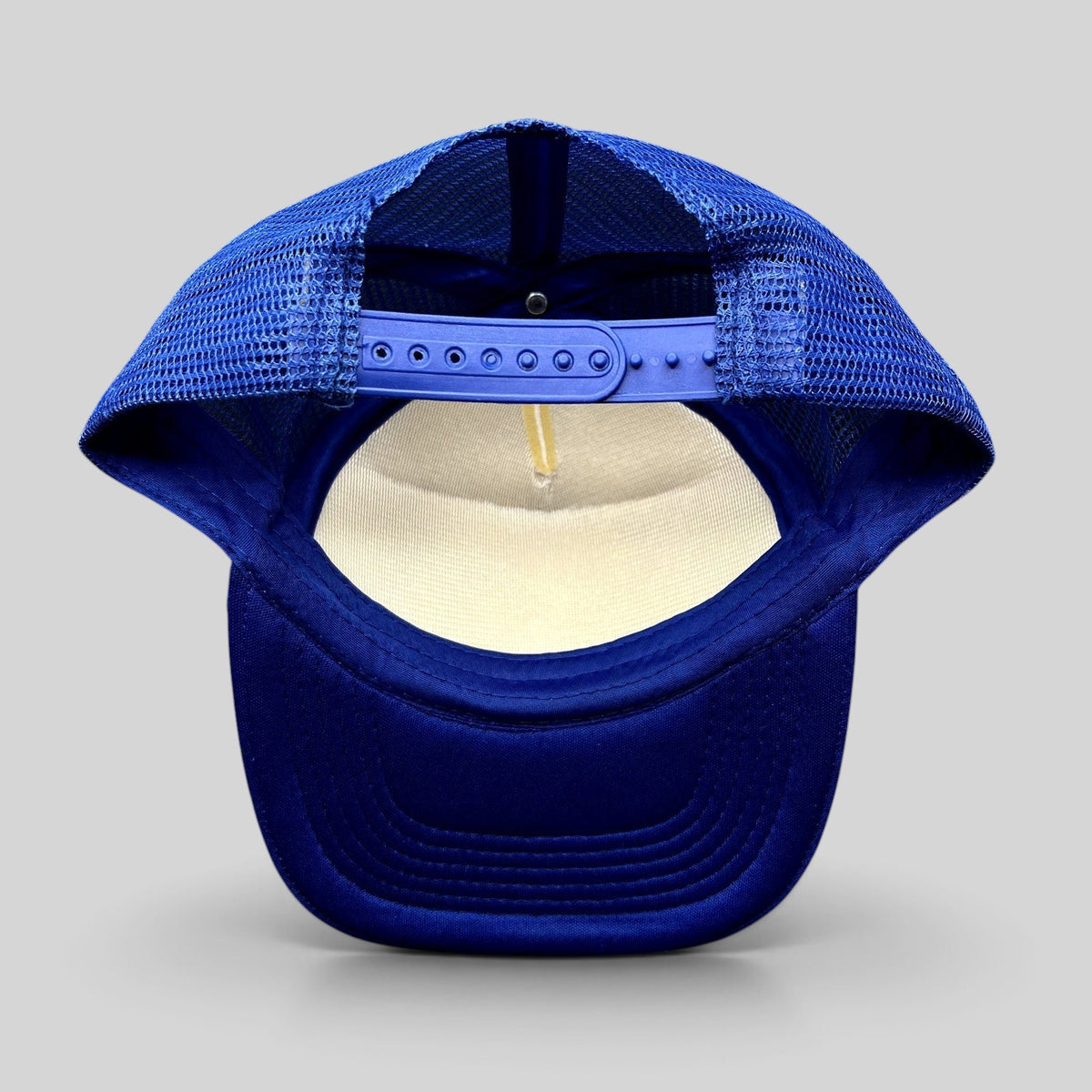 Raree Finds vintage Marlin Masters trucker hat showing the blue mesh back and adjustable snapback closure