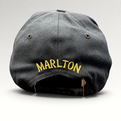 Raree Finds vintage black New Era snapback hat with gold Marlton embroidery on the back and adjustable plastic strap.