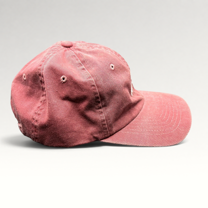 Raree Finds vintage maroon cotton dad cap by Sportsman with an unstructured fit and adjustable strapback closure.