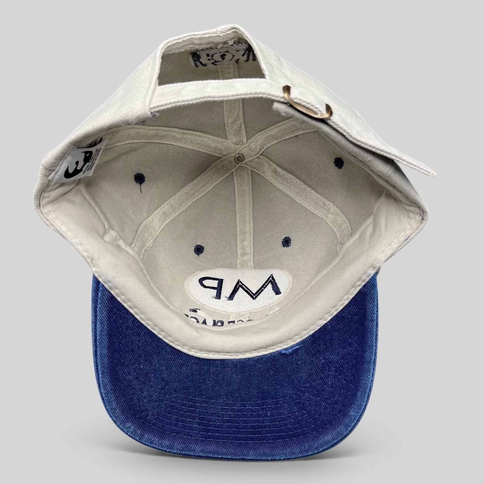 Raree Finds vintage 90s Melrose Place TV promo snapback cap, interior view showing white lining and blue brim.