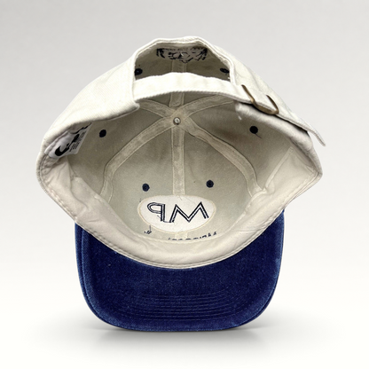 Raree Finds vintage Melrose Place FOX TV show strapback hat with cream crown, blue brim, and interior MP logo detail.