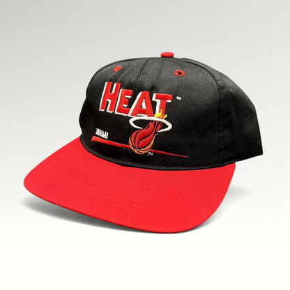 Raree Finds vintage 1990s Miami Heat NBA snapback hat with black crown, red brim, and embroidered team logo.