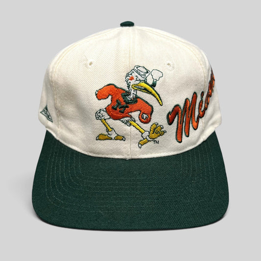 Raree Finds vintage Apex One Miami Hurricanes snapback hat with embroidered Sebastian the Ibis mascot and Miami script
