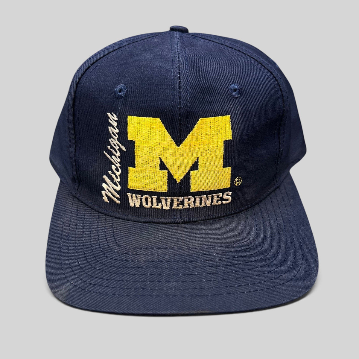 Raree Finds vintage navy Michigan Wolverines snapback hat with maize block M embroidery and collegiate lettering