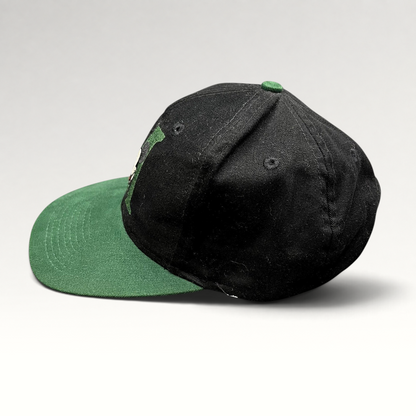 Raree Finds vintage 90s Disney Store Mickey Mouse snapback hat with a black crown and green flat brim