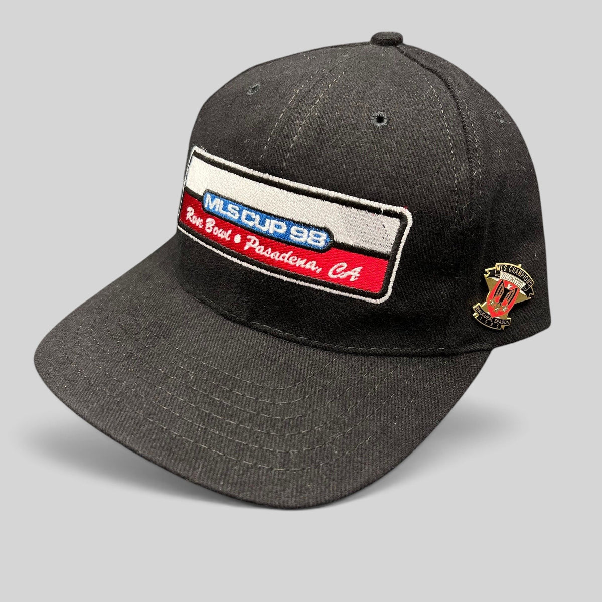 Raree Finds vintage 1998 MLS Cup black strapback hat with embroidered patch and DC United collectible side pin