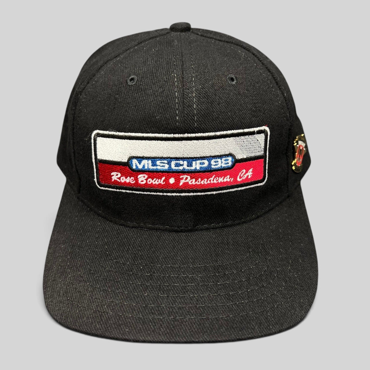 Raree Finds vintage 1998 MLS Cup black strapback hat by American Needle with embroidered Rose Bowl patch and DC United pin
