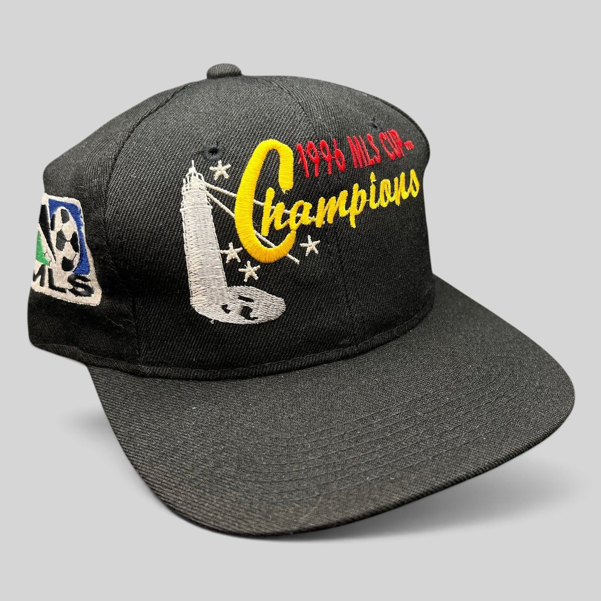 Raree Finds vintage 1996 DC United MLS Cup Champions black cotton snapback hat with multicolor trophy embroidery
