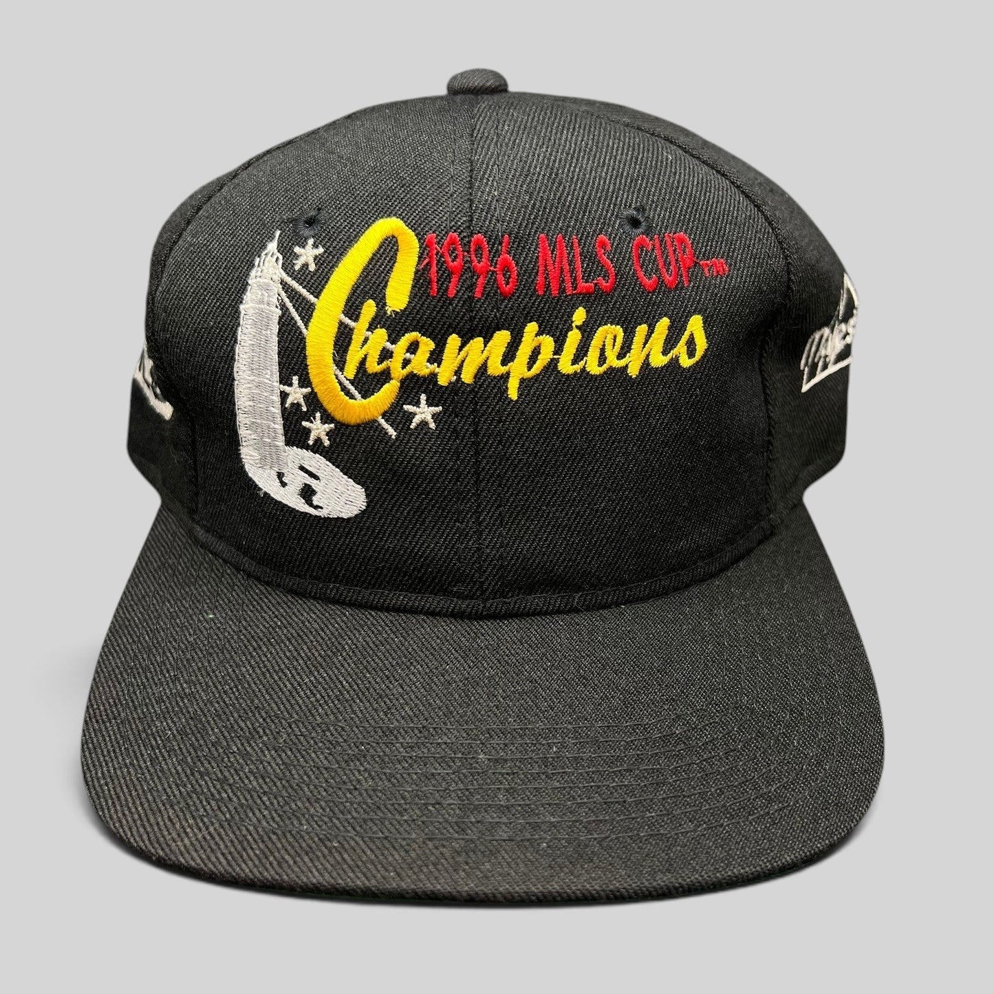 Raree Finds vintage 1996 MLS Cup Champions black cotton snapback hat with multicolor trophy embroidery