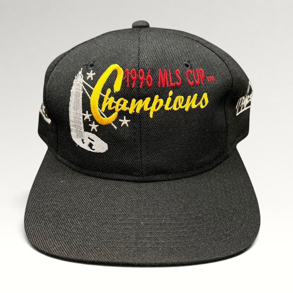 Raree Finds vintage 1996 MLS Cup Champions black cotton snapback hat with multicolor trophy embroidery