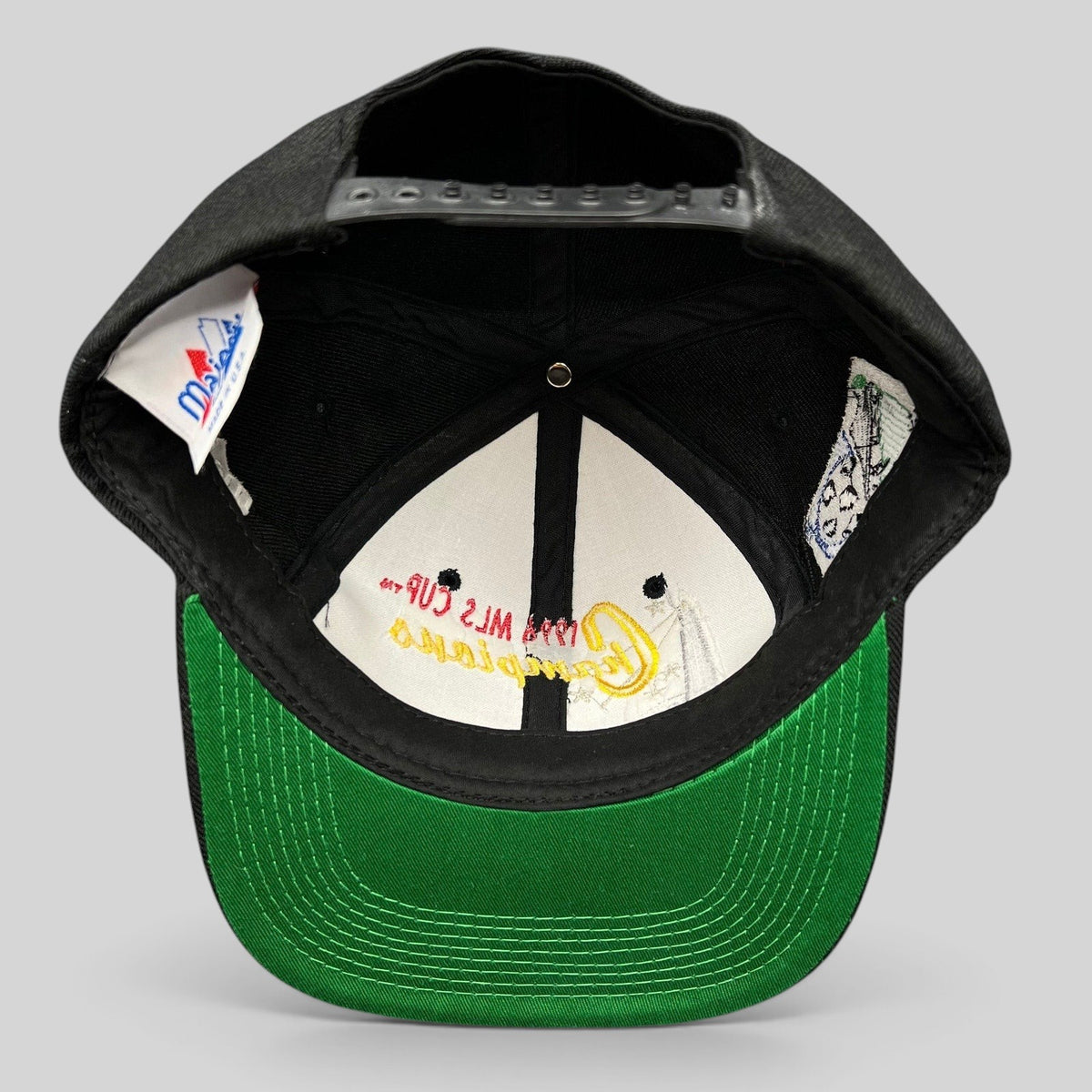 Raree Finds vintage 1996 DC United MLS Cup Champions snapback hat featuring a black crown and green undervisor