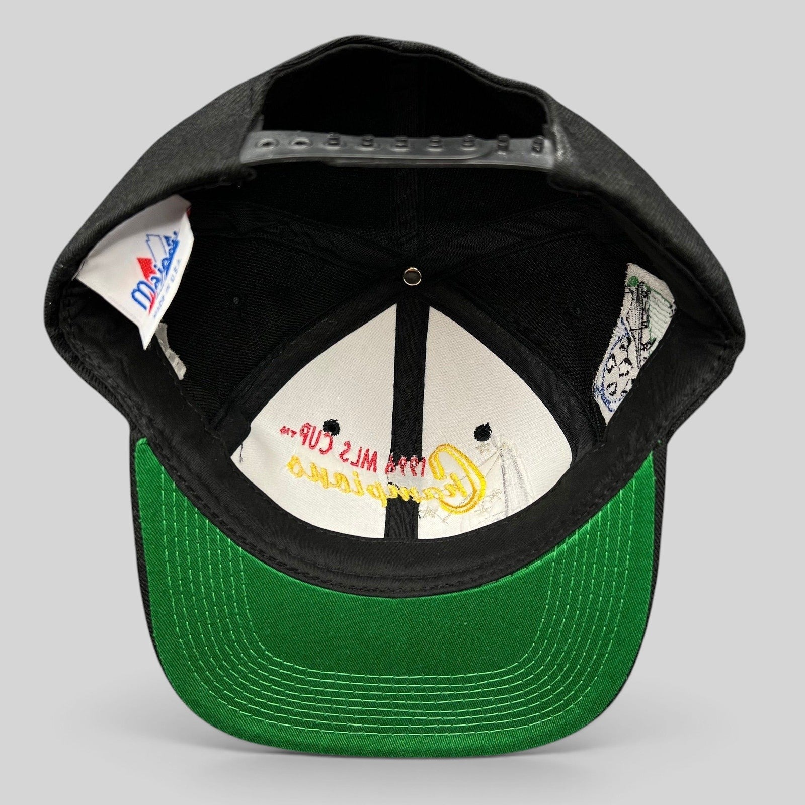 Raree Finds vintage 1996 DC United MLS Cup Champions snapback hat featuring a black crown and green undervisor