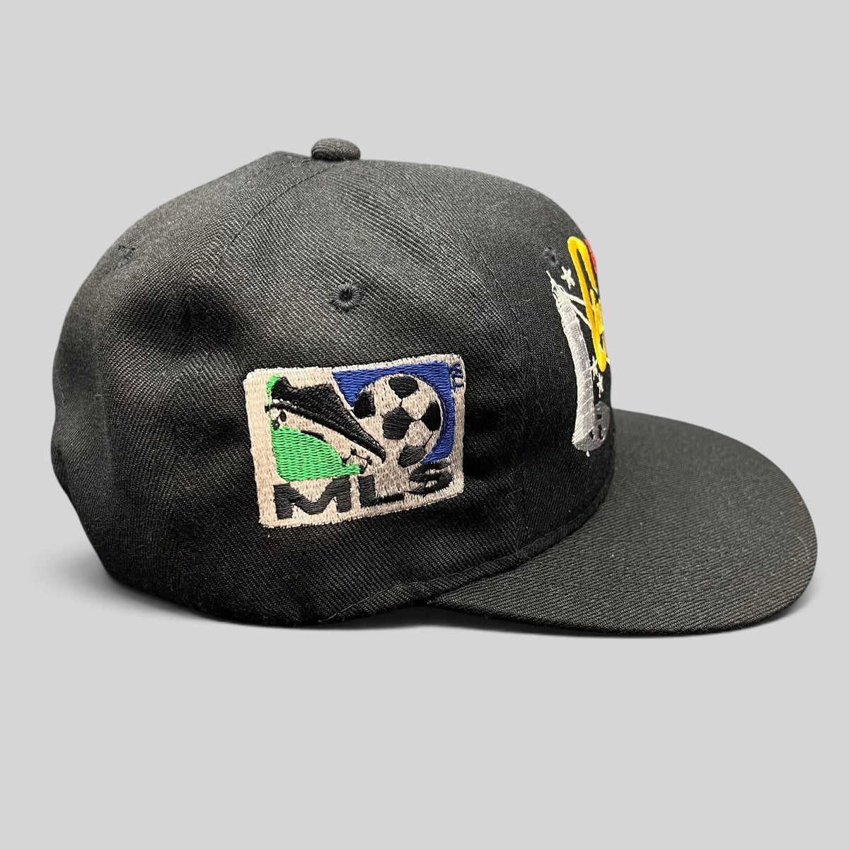 Raree Finds vintage 1996 DC United MLS Cup Champions black cotton snapback hat with embroidered soccer trophy logo