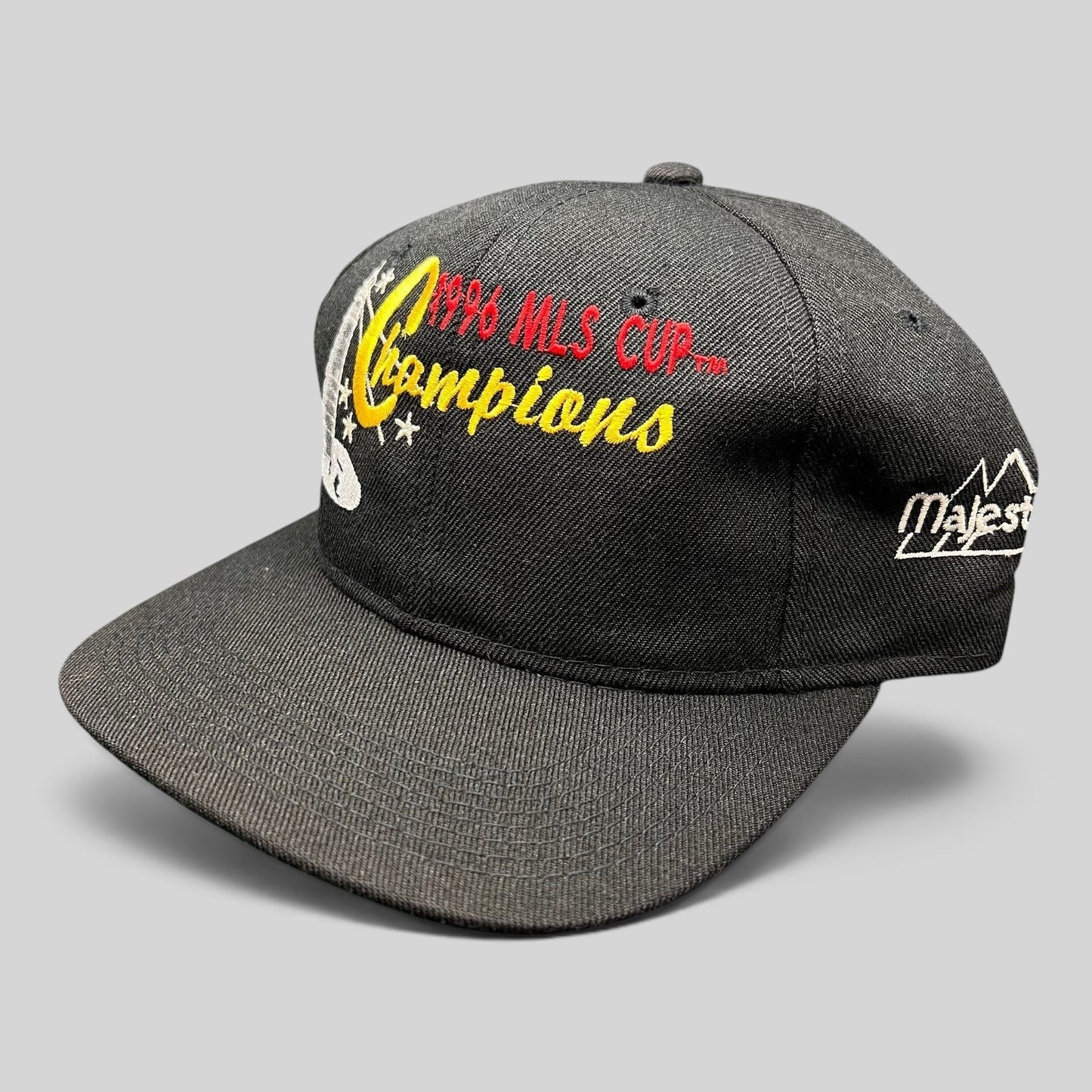 Raree Finds vintage 1996 DC United MLS Cup Champions black cotton snapback hat with multicolor trophy embroidery
