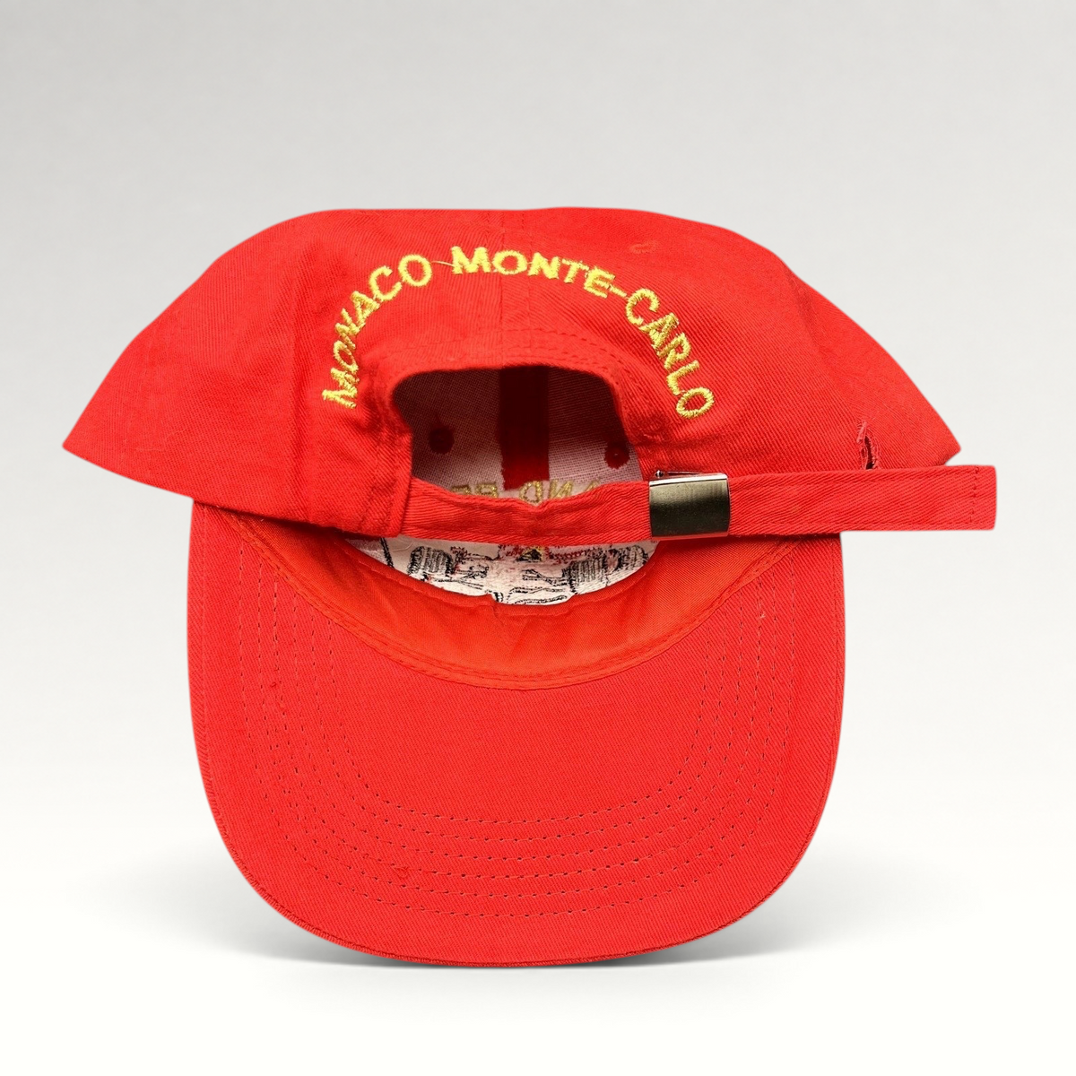 Raree Finds vintage red Monaco Grand Prix strapback hat with yellow Monaco Monte-Carlo embroidery on the back