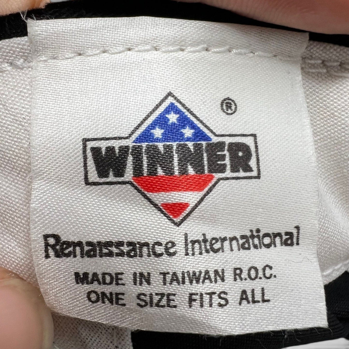 Raree Finds vintage 1994 Beverly Hills Cop III snapback hat interior tag showing Winner Renaissance International logo