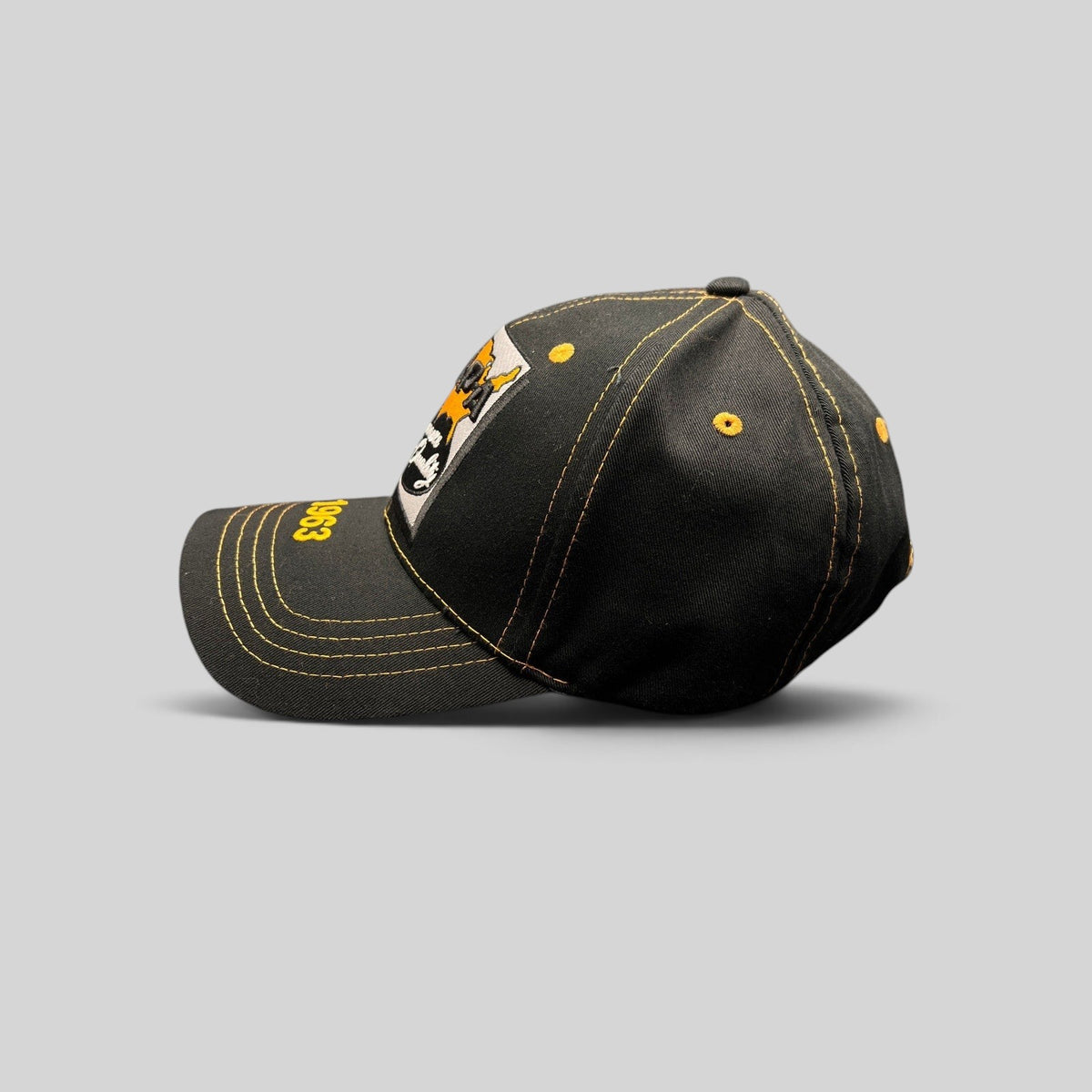 Raree Finds vintage black cotton NAPA Auto Parts strapback cap with yellow contrast stitching and 1963 brim detail