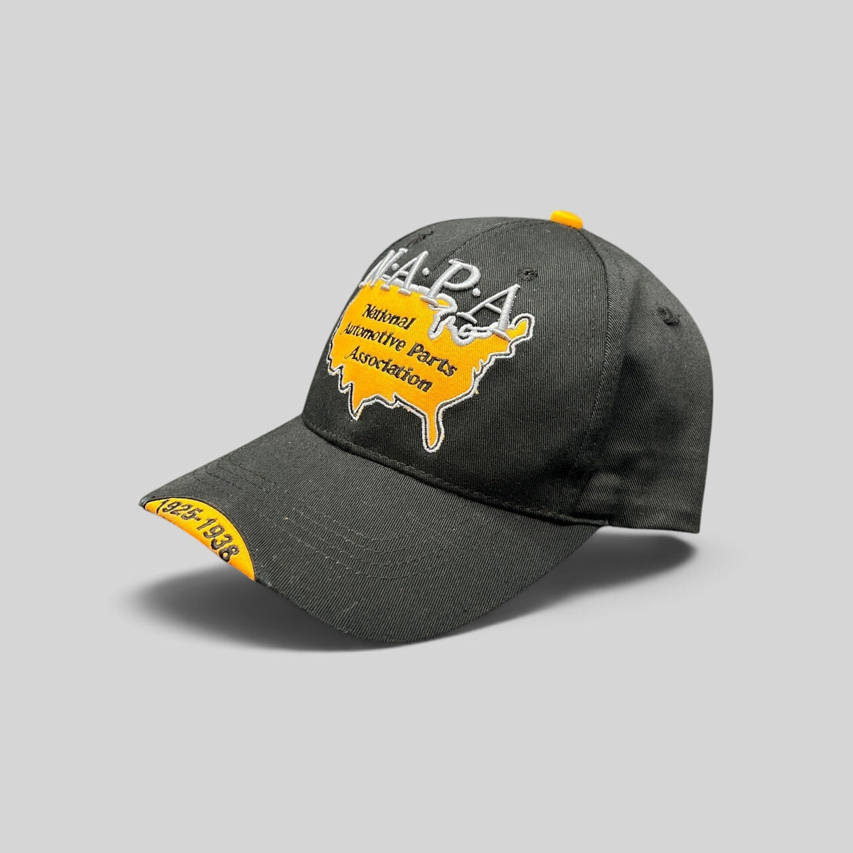 Raree Finds vintage black NAPA racing hat with embroidered USA map logo and 1925-1938 detail on the yellow brim.
