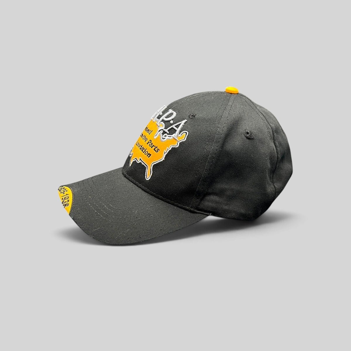 Raree Finds vintage black NAPA racing hat with embroidered USA map logo and yellow underbrim detail