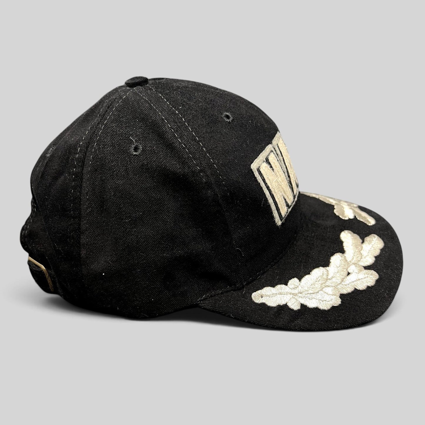 Raree Finds vintage American Needle black cotton strapback hat with cream NASA logo and embroidered brim leaf design