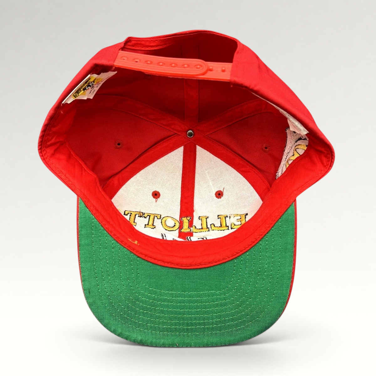 Raree Finds vintage 1995 Bill Elliott NASCAR snapback hat interior showing green undervisor and red structured crown