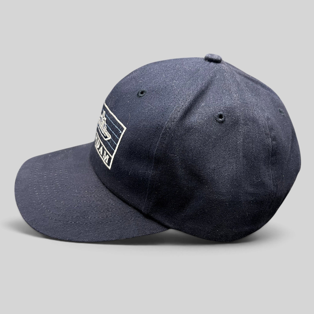 Raree Finds vintage navy blue cotton strapback hat featuring an embroidered Statendam Holland America cruise ship logo