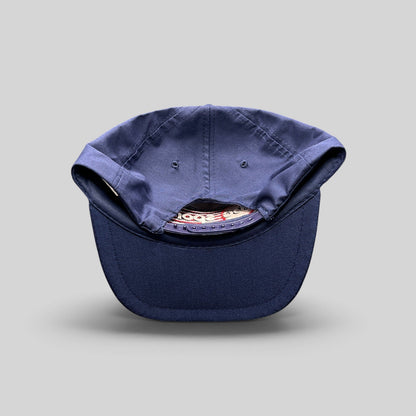 Raree Finds vintage 80s navy blue snapback hat with adjustable plastic closure and structured crown