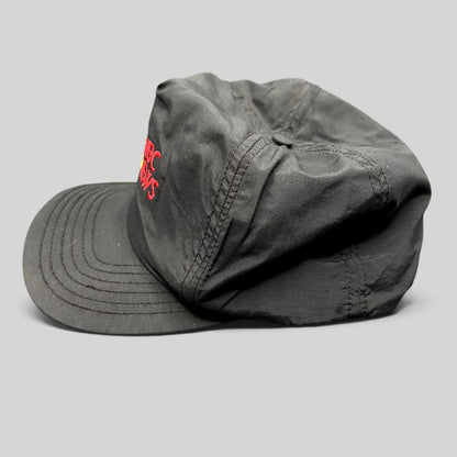Raree Finds vintage 90s black nylon NBC News snapback hat with embroidered peacock logo and red lettering