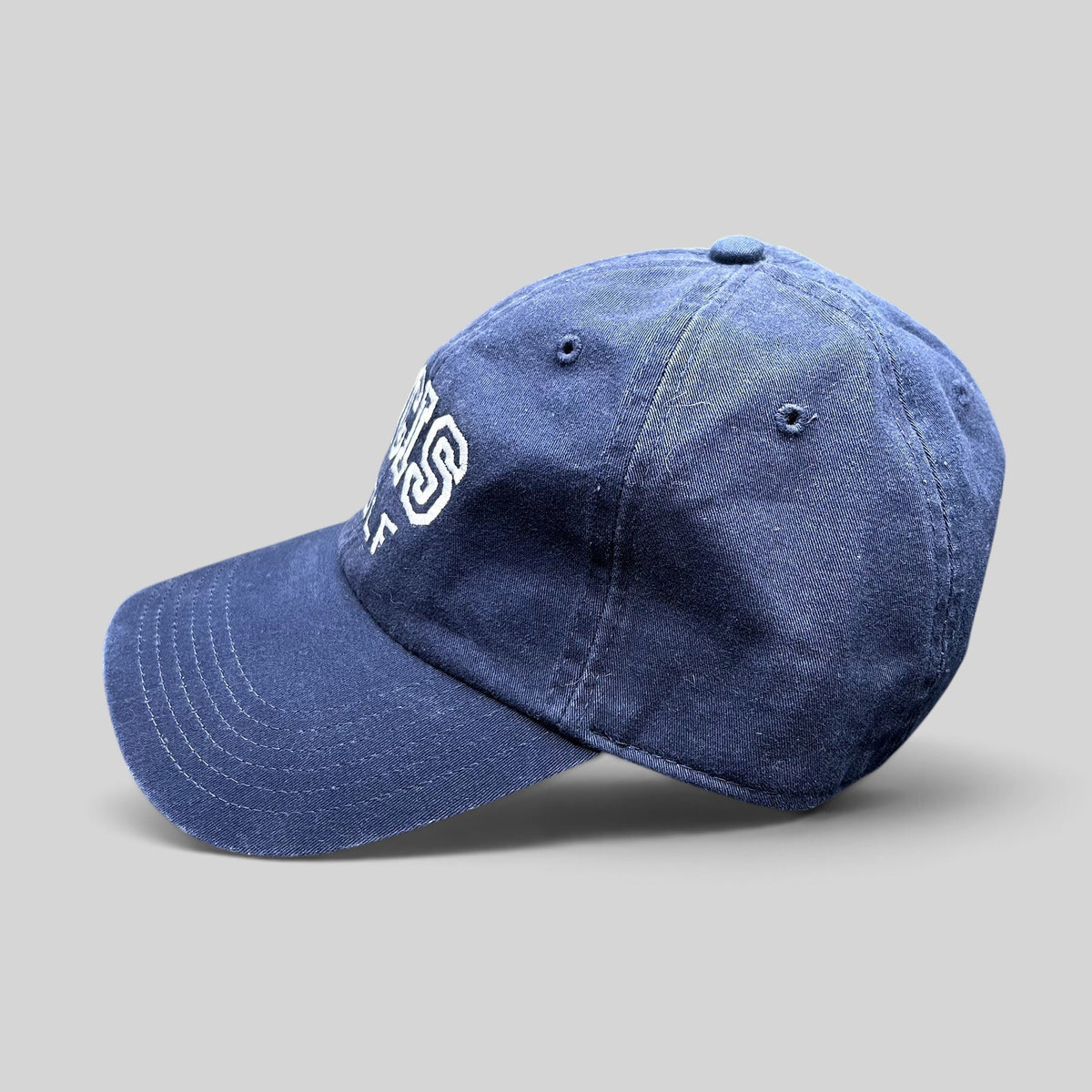 Raree Finds vintage navy blue NCIS golf tournament strapback hat with embroidered lettering and brass buckle