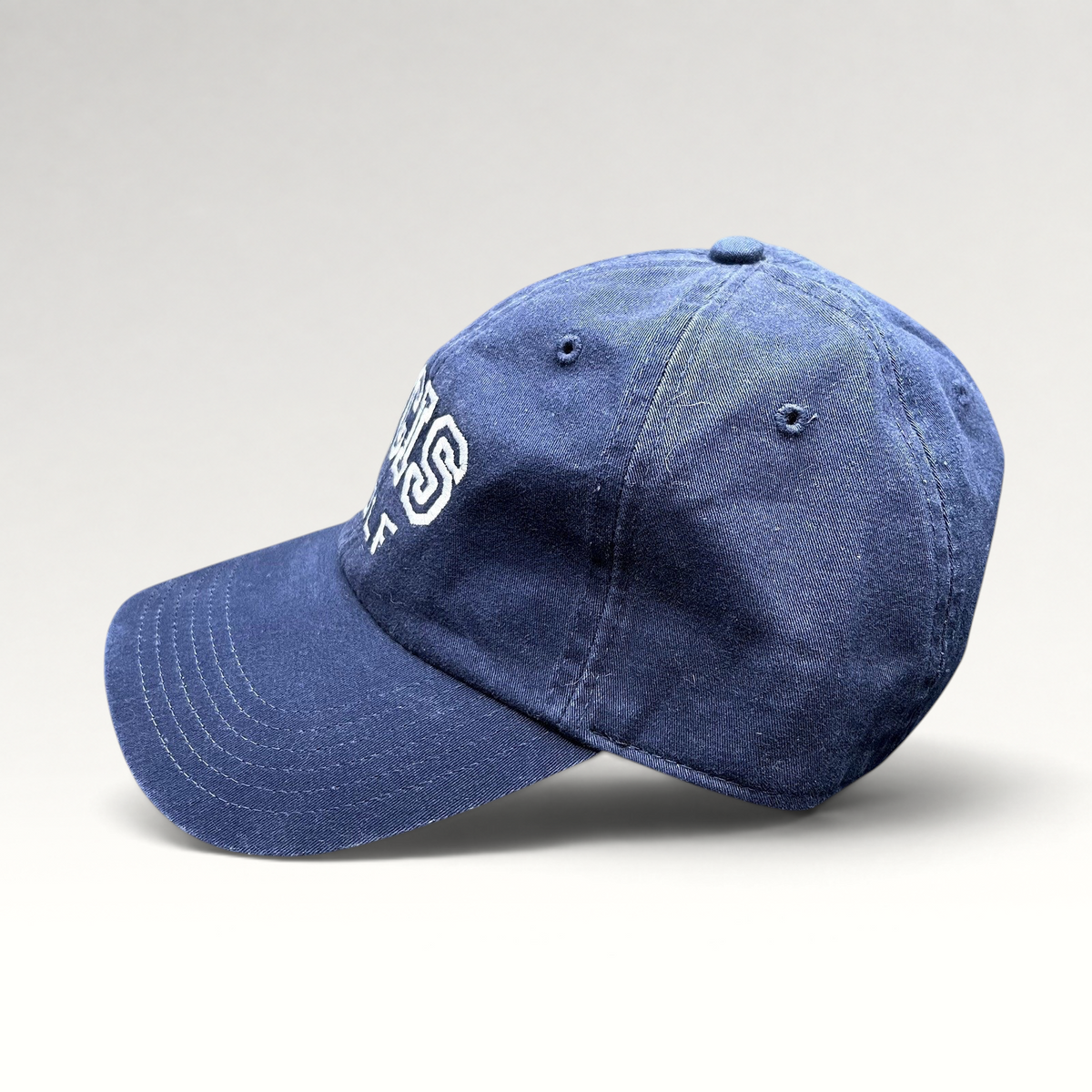 Raree Finds vintage navy blue NCIS golf tournament strapback hat with embroidered lettering and brass buckle