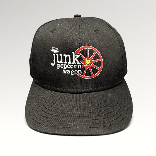 Raree Finds vintage New Era black snapback hat with embroidered Junk Popcorn Wagon Aspen logo and red wheel graphic