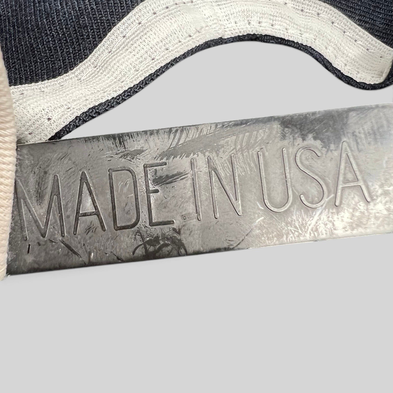 Raree Finds vintage New Era Pro Model snapback hat featuring a metallic Made in USA tag detail