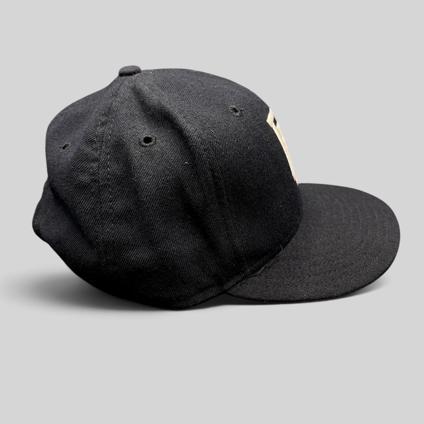 Raree Finds vintage New Era USA made navy snapback hat with interlocking FL embroidery and gray undervisor
