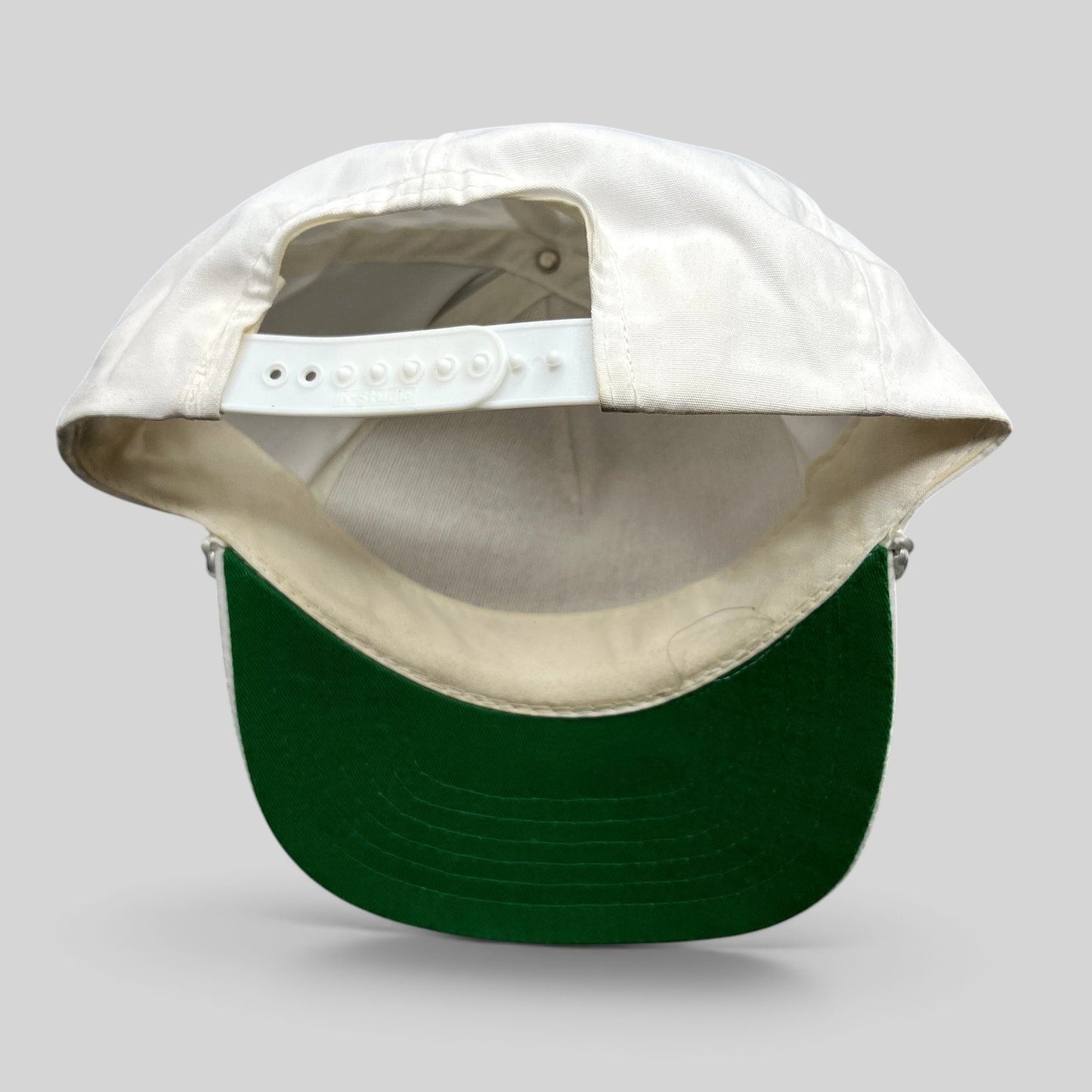 Raree Finds vintage 1989 NFL American Bowl San Francisco 49ers snapback hat featuring a white crown and green undervisor