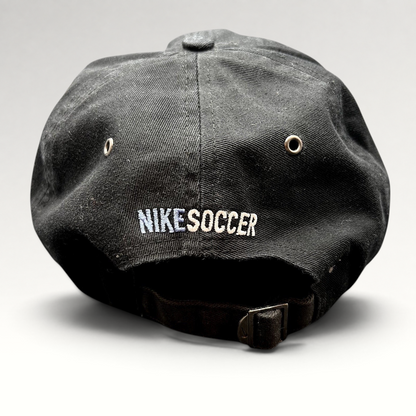 Raree Finds vintage black Nike Soccer strapback hat with embroidered logo and adjustable metal buckle back closure.