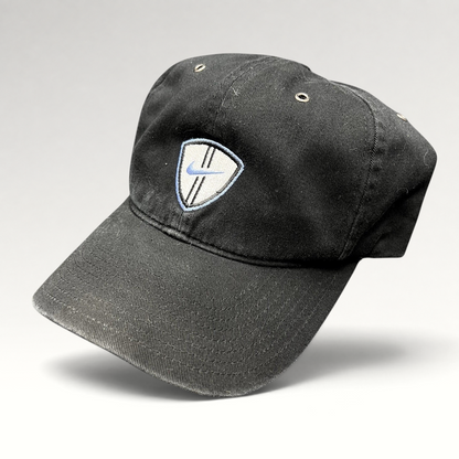 Raree Finds vintage black Nike soccer strapback hat with an embroidered shield crest and blue swoosh logo.