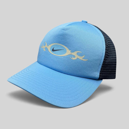 Raree Finds vintage light blue Nike trucker hat with navy mesh back and tribal oval swoosh logo graphic